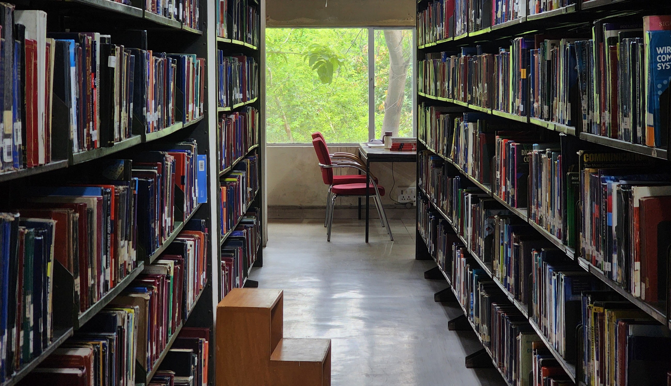 A scholarly aisle in the Central Library at IIT Delhi.